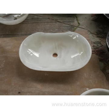 White round onyx vessel sink